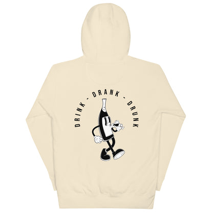 "Beige-shirt with black cartoon-style print of a walking wine bottle holding a glass, surrounded by the words 'Drink Drank Drunk' in bold text."