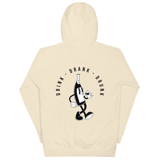 "Beige-shirt with black cartoon-style print of a walking wine bottle holding a glass, surrounded by the words 'Drink Drank Drunk' in bold text."