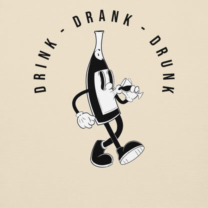 "beige t-shirt with black cartoon-style print of a walking wine bottle holding a glass, surrounded by the words 'Drink Drank Drunk' in bold text."